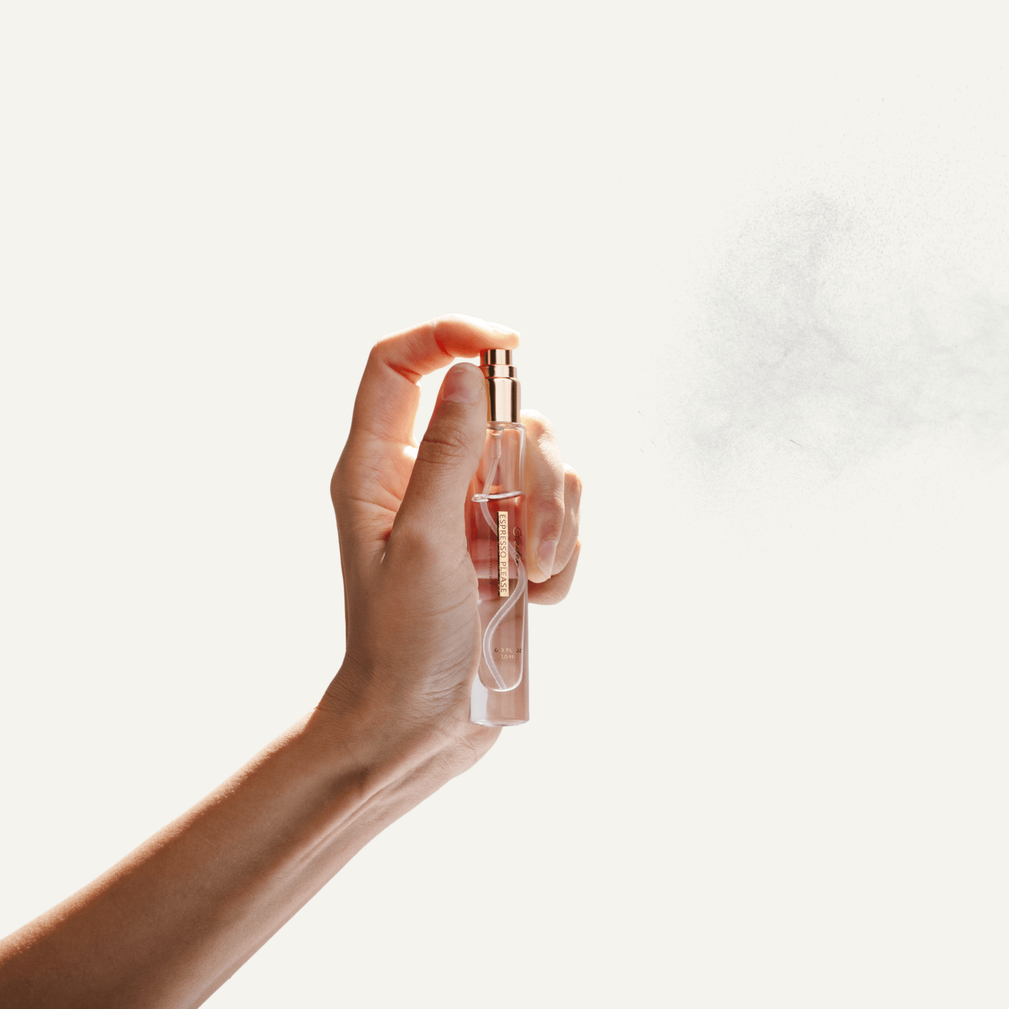 Natural Coffee Air Freshener made with essential oils by &Eden being sprayed